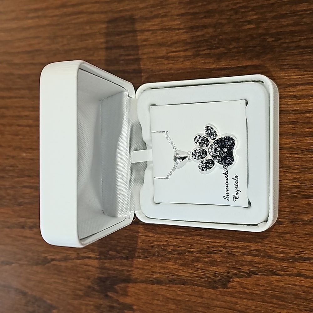 Swarovski crystal in silver paw print necklace